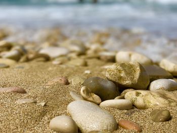 Close-up of stones on beach