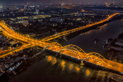 High angle view of illuminated city at night