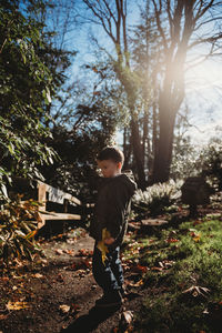 Boy standing on land