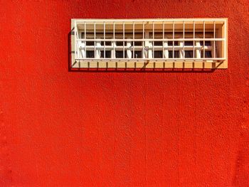 Low angle view of window on wall of building