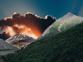 Scenic view of snowcapped mountains against sky