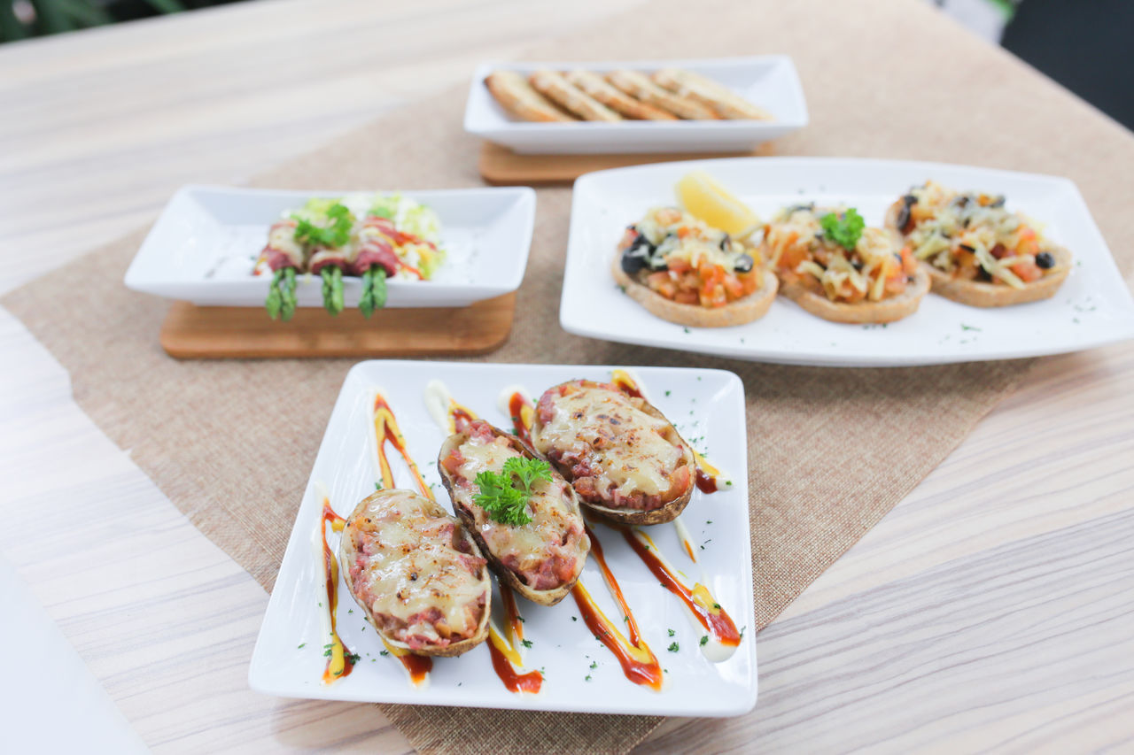 CLOSE-UP OF FOOD ON TABLE