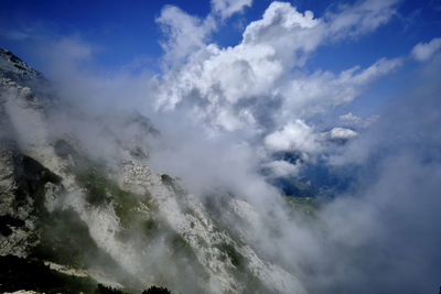 Low angle view of clouds over lake