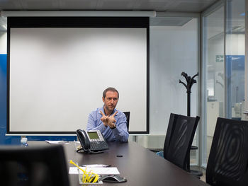 Man working on laptop in office