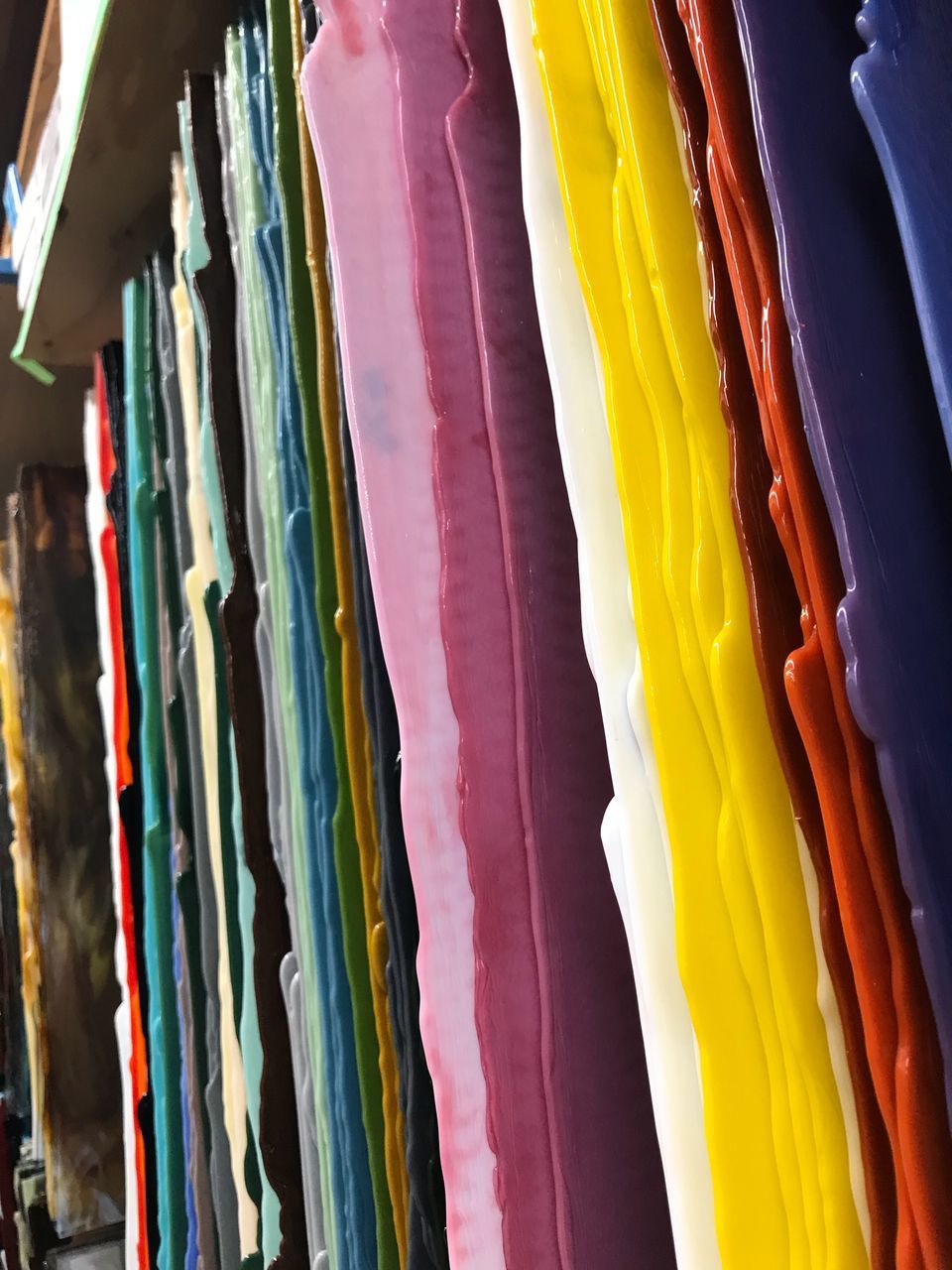 FULL FRAME SHOT OF MULTI COLORED FABRIC AT STORE