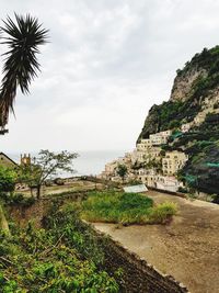 Scenic view of bay against sky