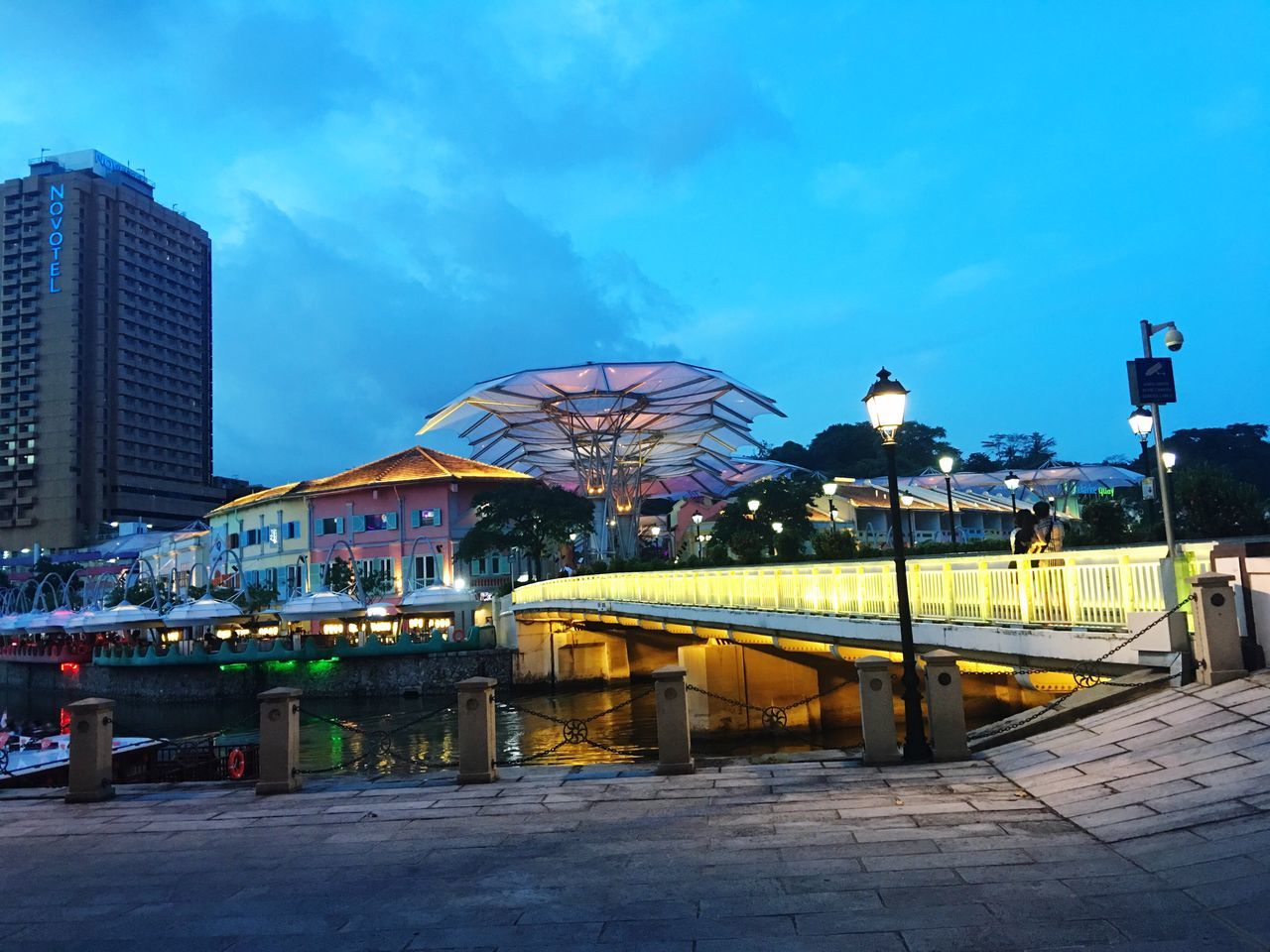 VIEW OF BUILDINGS AGAINST BLUE SKY