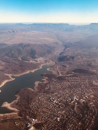 Aerial view of dramatic landscape against sky