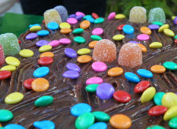 Close-up of multi colored candies on table