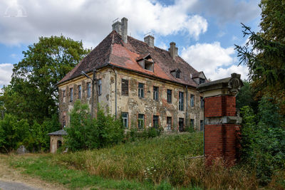 Low angle view of old building against sky