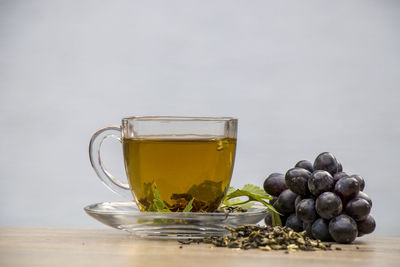 Close-up of tea in glass on table