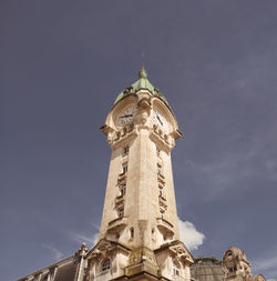 Low angle view of bell tower against sky