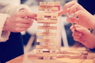Close-up of baby playing on stack