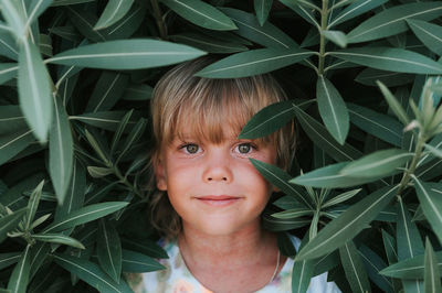 Portrait face of candid happy little kid boy of five years old with problem allergic skin