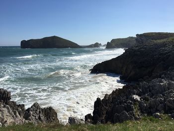 Scenic view of sea against clear sky