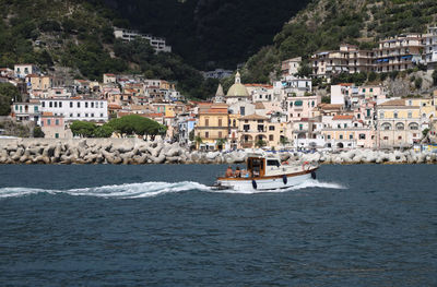 Scenic view of sea against mountain