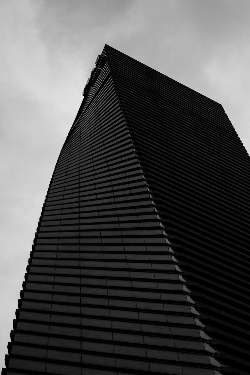 building exterior, architecture, built structure, low angle view, sky, modern, tall - high, office building, skyscraper, tower, city, building, pattern, tall, cloud - sky, day, outdoors, no people, cloud, architectural feature