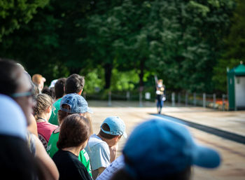 Rear view of people watching event