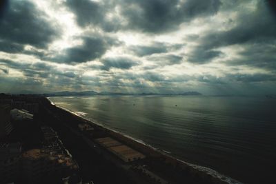 Scenic view of sea against cloudy sky