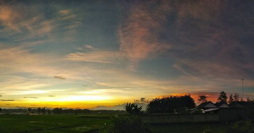 Scenic view of landscape against sky during sunset