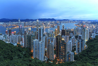 Illuminated two international finance center in city seen from victoria peak