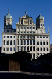 Low angle view of building against sky in city