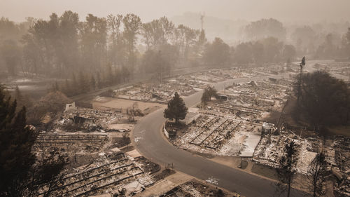 Forest fire destroys mobile homes and flips peoples lives upside down after fire blows through town.