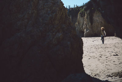 Woman standing at beach