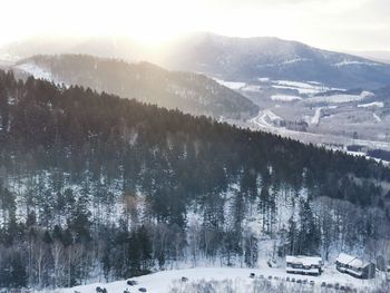 Scenic view of snow covered mountains