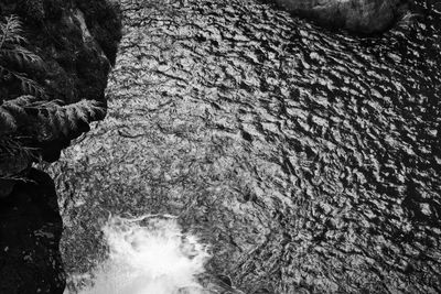 Close-up of water flowing through rocks