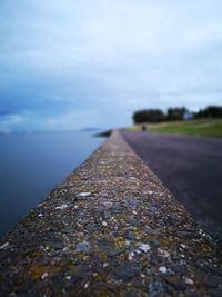 Surface level of road against sky