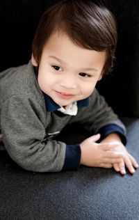 Portrait of cute baby girl sitting