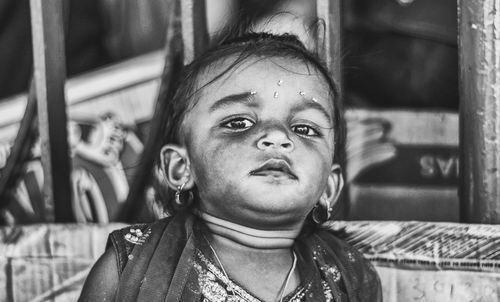 Close-up portrait of cute girls outdoors