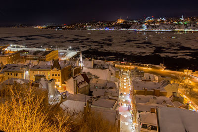 High angle view of illuminated city at night