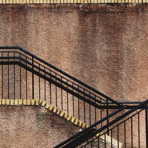 High angle view of staircase against wall