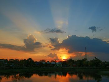 Scenic view of sunset over city
