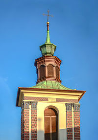 Low angle view of building against blue sky