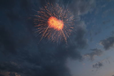 Low angle view of fireworks in sky
