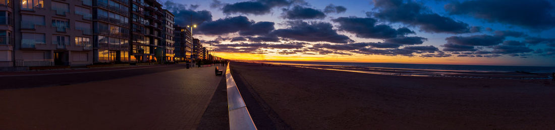 Panoramic view on an empty beach of sint-idesbald in koksijde with a nice evening sunset light