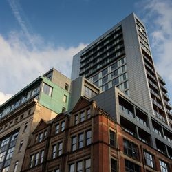 Low angle view of modern buildings against sky