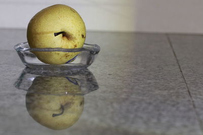 Close-up of apple on table