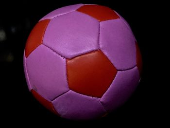 Close-up of multi colored ball in background