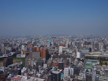 Cityscape against clear sky