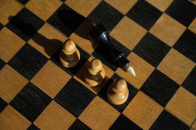 Close-up of chess pieces on board