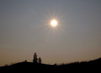Sun shining through clouds