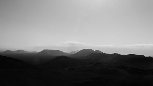 Scenic view of mountains against clear sky