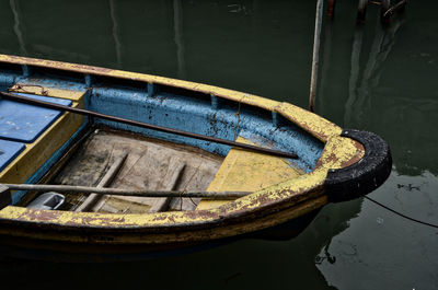 High angle view of old boat moored in lake