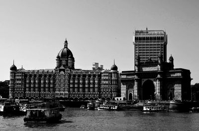 Cathedral by river in city