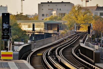 Train on railroad tracks in city