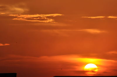 Low angle view of dramatic sky during sunset